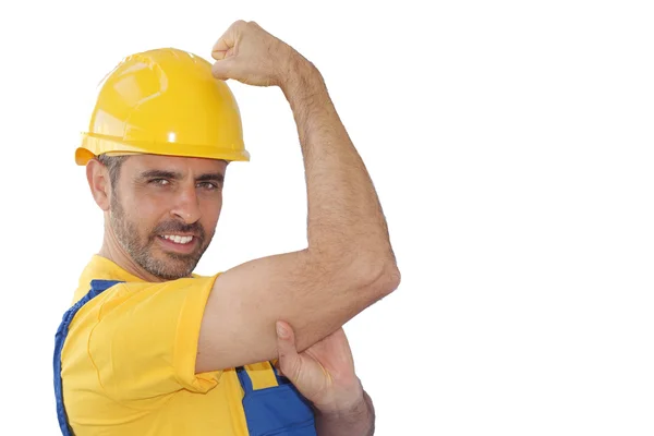 Trabajador flexionando sus músculos mostrando fuerza de trabajo — Foto de Stock