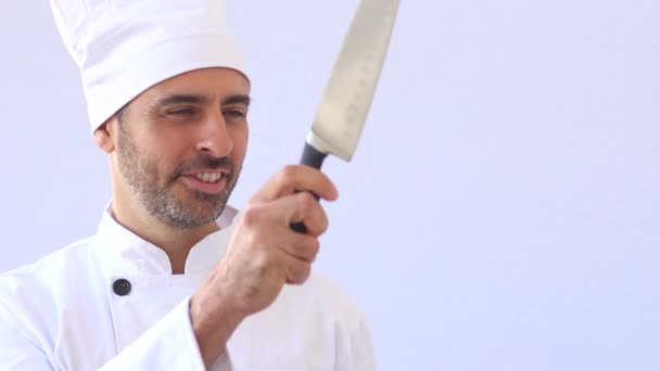 Chef with knife cutting copy space — Stock Video