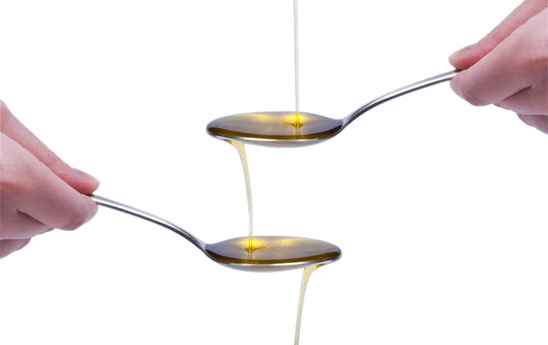 Olivenöl auf weißem Hintergrund — Stockfoto