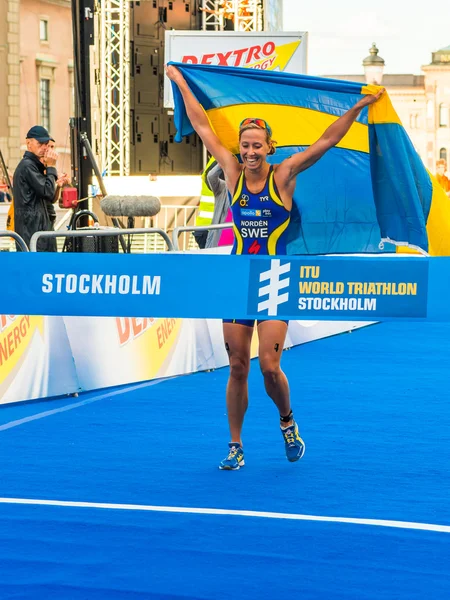 Stockholm - Lisa Norden thru the finishline, happy with the Swe
