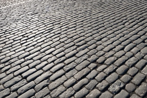 Cobblestones iluminados pelo sol — Fotografia de Stock