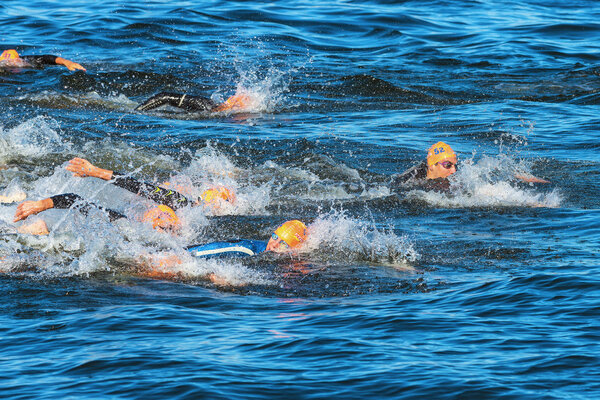 STOCKHOLM - AUG, 25: The chaotic start in the mens swimming in the cold water at the Mens ITU World Triathlon Series event Aug 25, 2013 in Stockholm, Swede