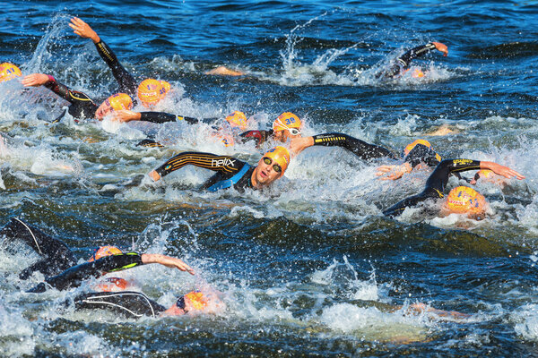 STOCKHOLM - AUG, 25: The chaotic start in the mens swimming in the cold water in the Mens ITU World Triathlon Series event Aug 25, 2013 in Stockholm, Swede