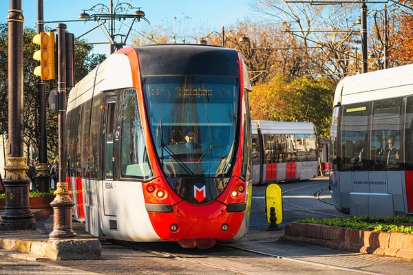 Modern tram trains meeting in Sultanahmet district on cobbleroad — Stock Photo, Image