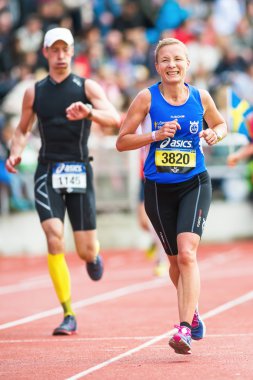 stockholm stadion asics St son streç çalışan kadın