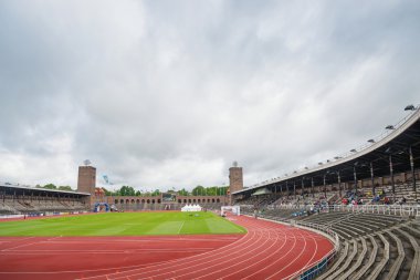 The Stockholm Stadium just before the start of the marathon clipart