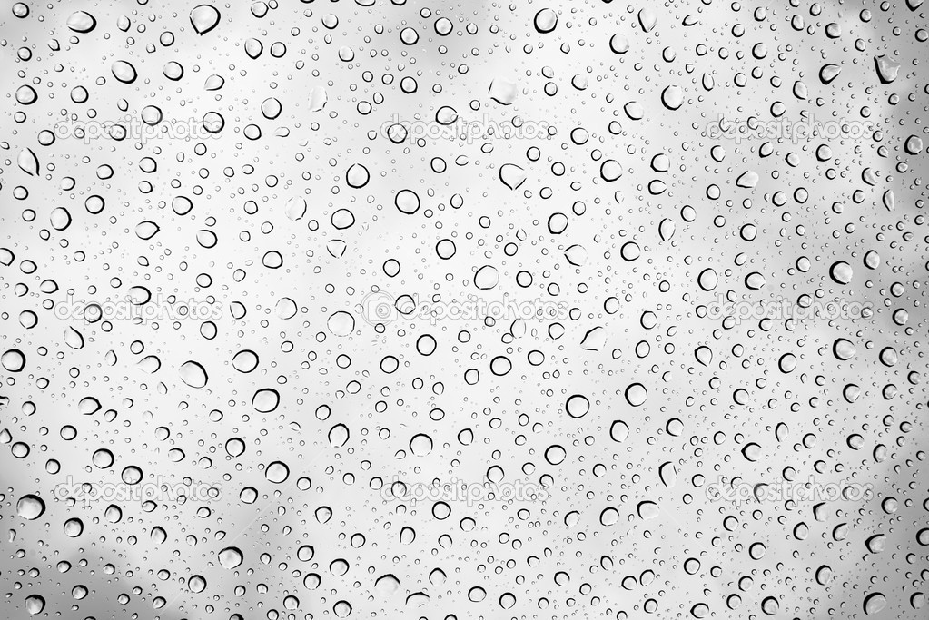 Water drops on glass in black and white