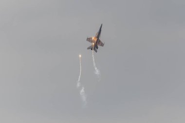 UPPSALA, SWEDEN - AUG 27, 2022: Finnish F/A 18 Hornet during the air display with flares.
