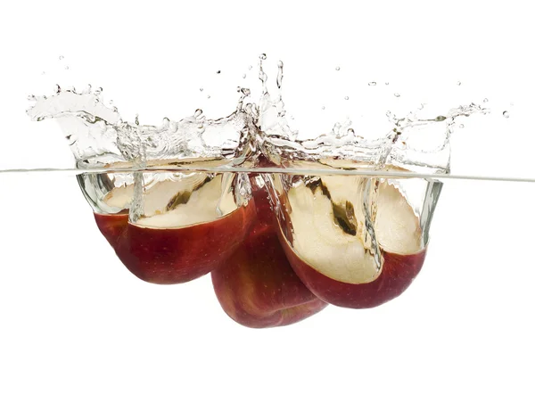 Splash de fatias de maçã — Fotografia de Stock