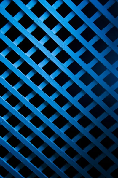 Luce morbida blu su arte geometrica di legno — Foto Stock