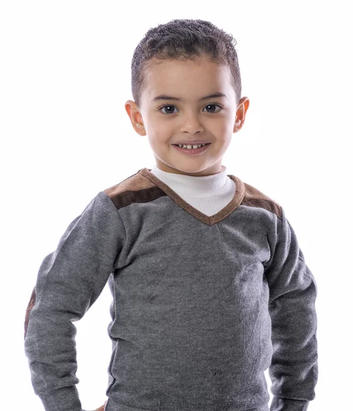 Fiducioso bambino in piedi con un sorriso — Foto Stock