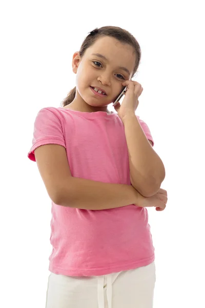 Lilla leende tjej som har ett telefonsamtal — Stockfoto