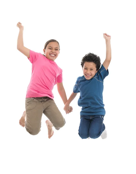 Active Joyful Kids Jumping with Joy Stock Image