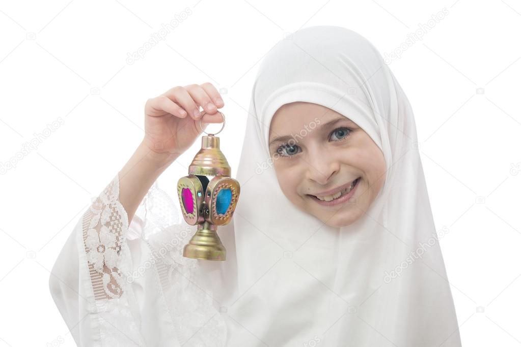 Smiling Muslim Girl  in Hejab Holding Ramadan Lantern