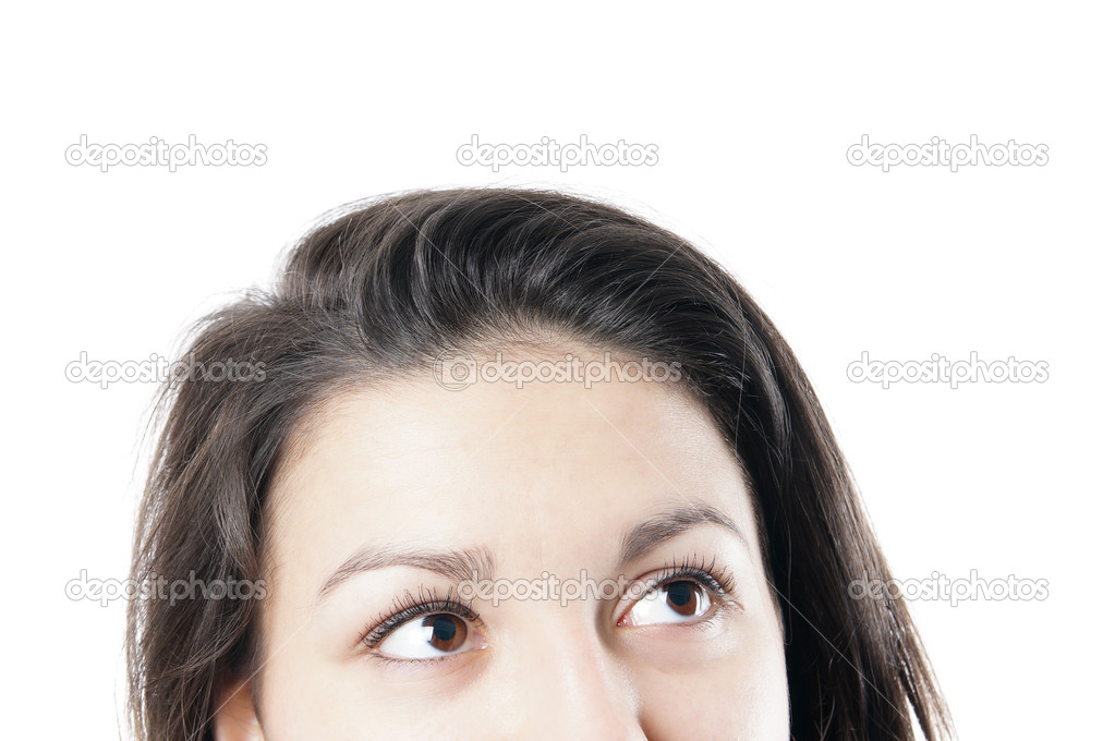 female eyes looking up into corner