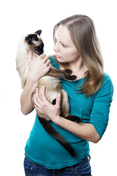Woman telling off cat — Stock Photo, Image