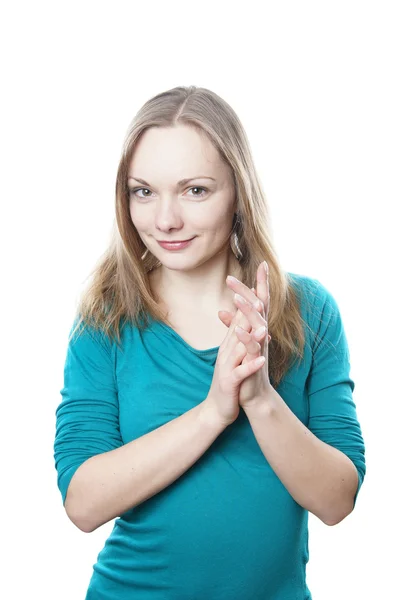 Young blonde woman rubbing hands — Stock Photo, Image