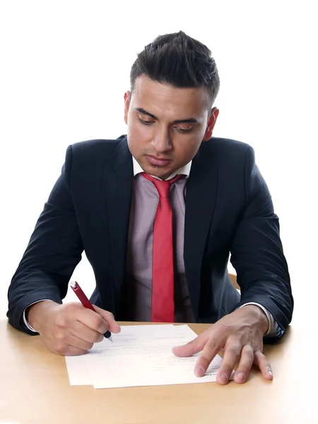 Young man signing contract — Stock Photo, Image