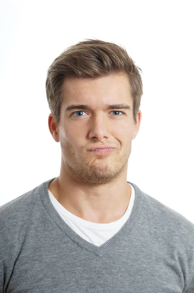 Displeased young man — Stock Photo, Image