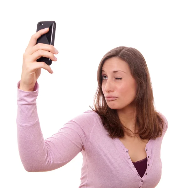 Jeune femme prenant selfie — Photo