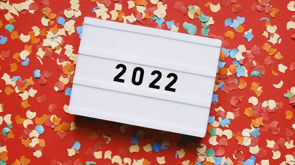 New year 2022 party celebration flat lay with confetti — Stock Photo, Image
