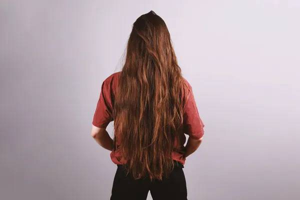 Brunette woman with very long hair down to her butt — Stock Photo, Image