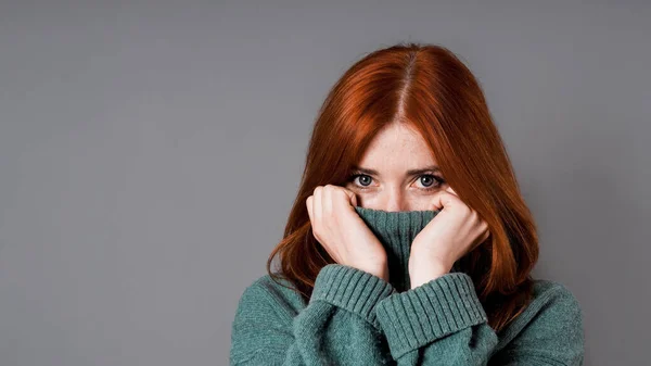 Shy Embarrassed Woman Pulling Turtleneck Sweater Her Face — Stock Photo, Image