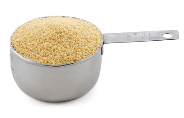 Cous cous presented in an American metal cup measure — Stock Photo, Image