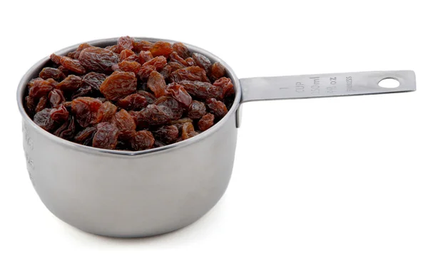 Raisins presentato in una misura tazza di metallo americano — Foto Stock