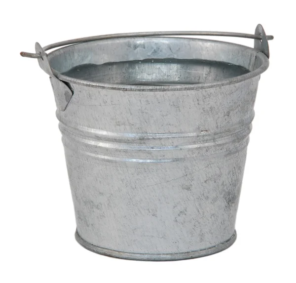 Fresh water in a miniature metal bucket — Stock Photo, Image