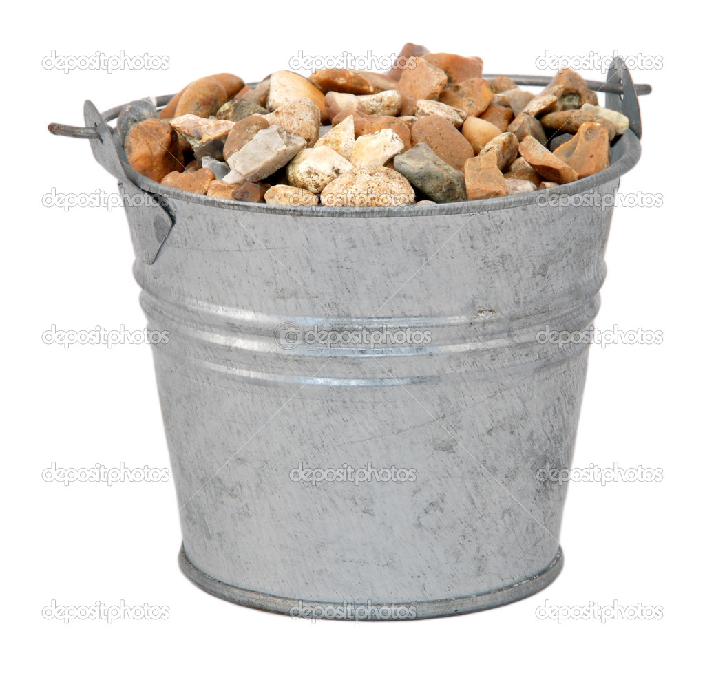 Gravel or small stones in a miniature metal bucket