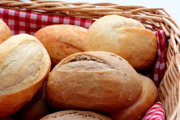 Tasty fresh bread rolls in a basket
