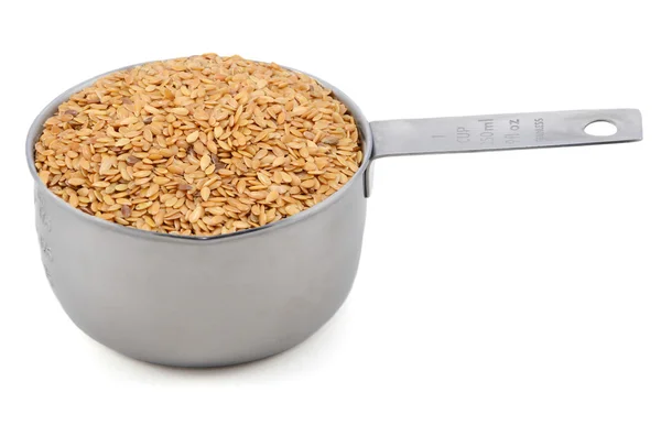 Golden linseed in an American cup measure — Stock Photo, Image