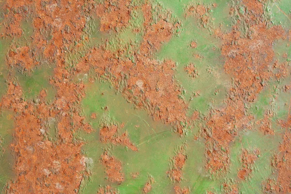 Abblätternde Farbe und Rostflecken auf einem Blech — Stockfoto