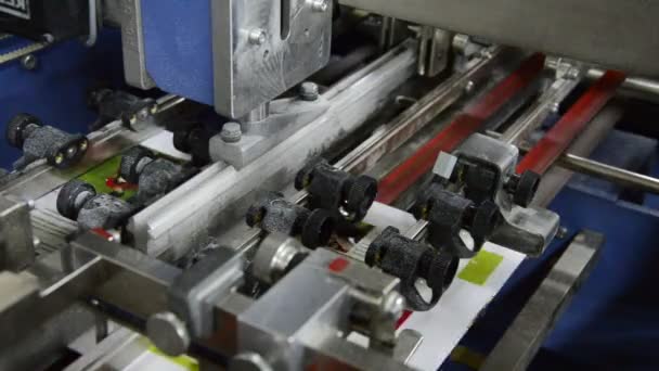 Folding machine folds printed offset sheet — Stock Video