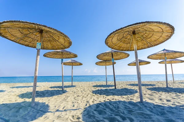 Beach straw umbrella — Stock Photo, Image