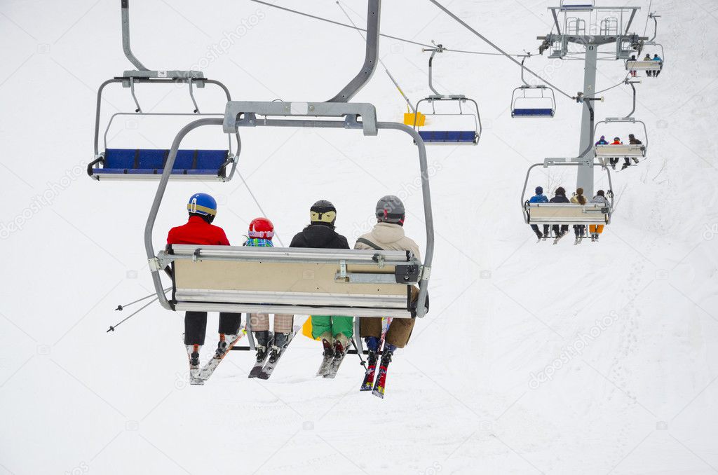 : Chair ski lift elevator lifting people