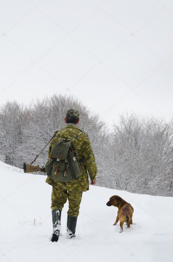 Male hunter with dog