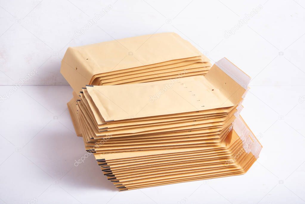 Lot of brown bubble envelopes on the office desk