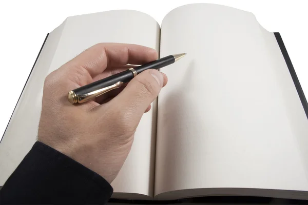 Handschrift in offenem Buch mit Kugelschreiber — Stockfoto
