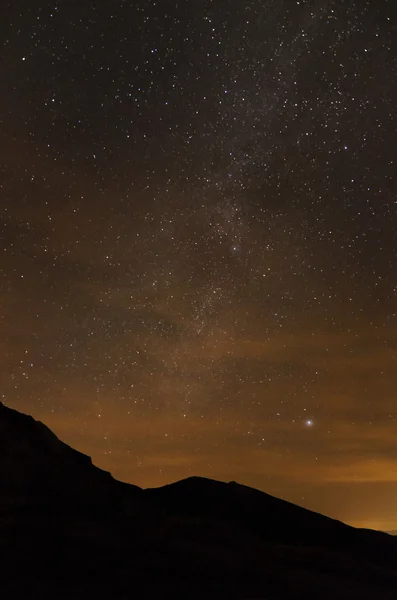 Milky way, Andromeda galaxy and satellite trail — Stock Photo, Image