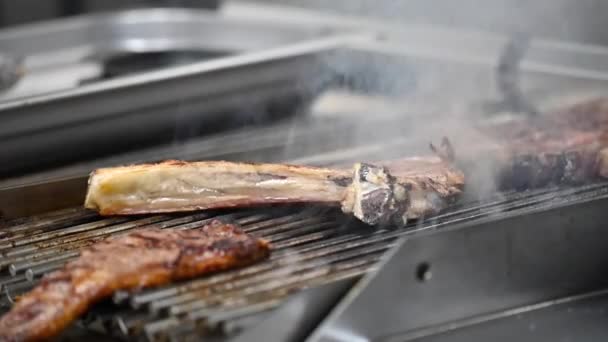 Close up of Beef steak is being cooked on grill. — Stock Video