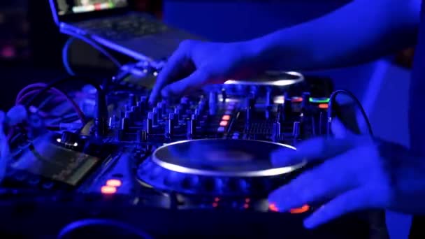 Close-Up of Dj Mixer Controller Desk in Night Club Disco Party. DJ Hands touching Buttons and Sliders Playing Electronic Music . — Stock Video