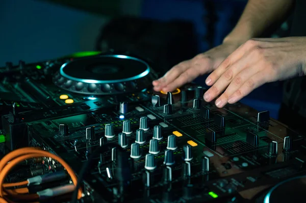 Dj mixing at party festival with light and smoke in background - Summer nightlife view of disco club inside. — Stock Photo, Image