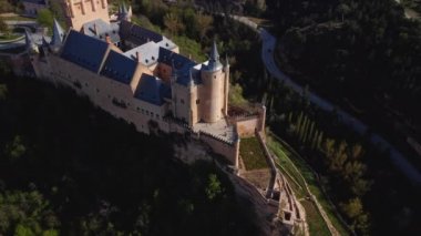 Aerial view of Segovia Alcazar, famous landmark in Segovia, Spain. High quality 4k footage. High quality 4k footage