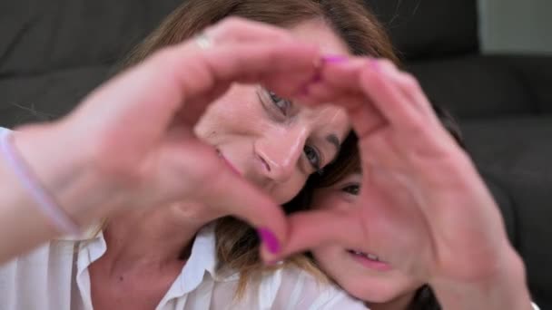 Mother Her Little Son Showing Heart Shape Fingers High Quality — Video