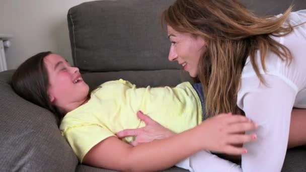 Loving Mother Tickling Her Little Daughter Sofa Home High Quality — Vídeo de Stock