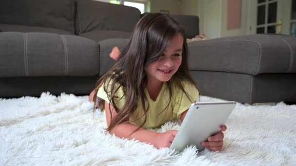 Cute Little Girl Watch Cartoons Digital Tablet Kid Lies Floor — Αρχείο Βίντεο