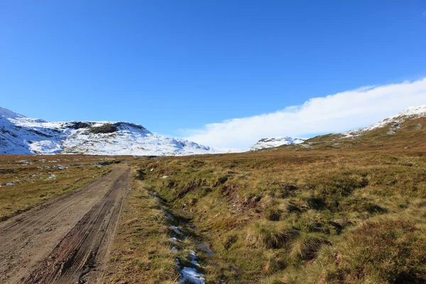 Onverharde weg — Stockfoto