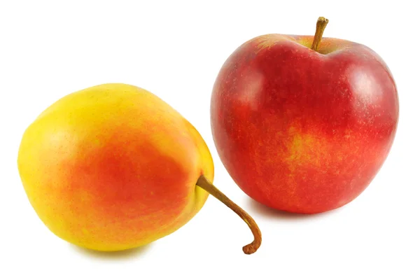 Keltainen päärynä ja punainen omena — kuvapankkivalokuva